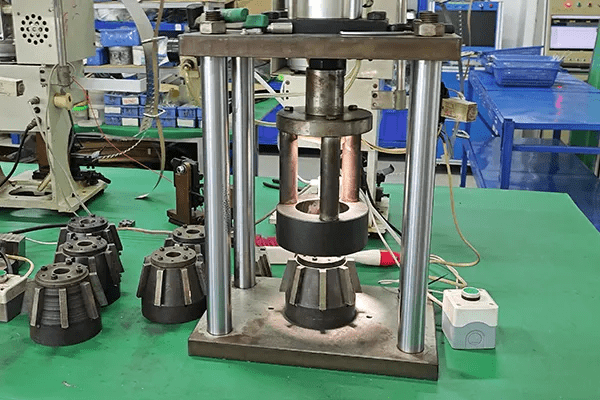 Metal shell sealed and riveted